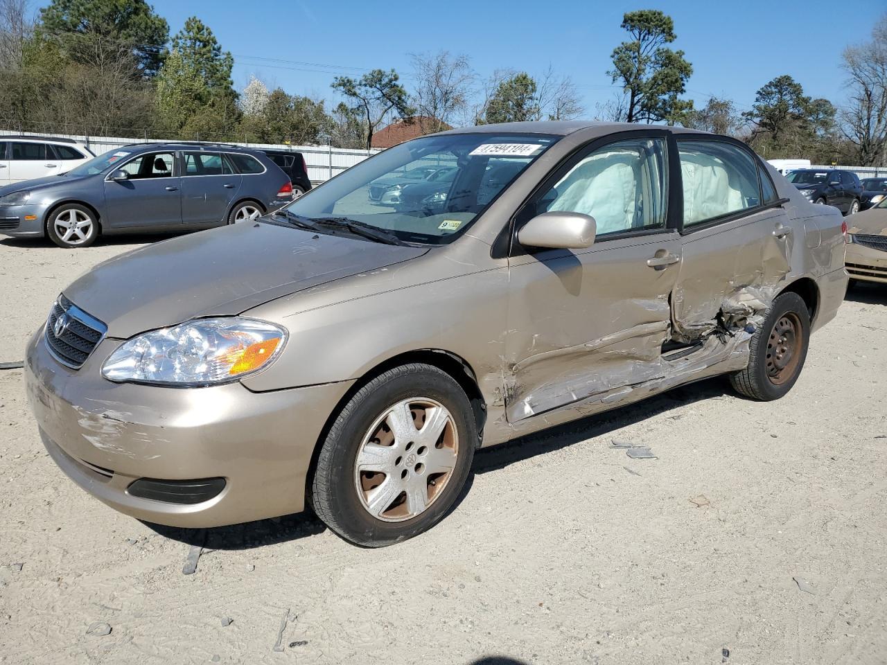 TOYOTA COROLLA CE 2005 tan sedan 4d gas 1NXBR30E45Z477747 photo #1