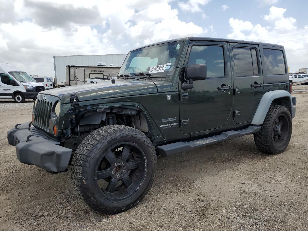 JEEP WRANGLER U 2011 green  gas 1J4HA3H15BL564821 photo #1