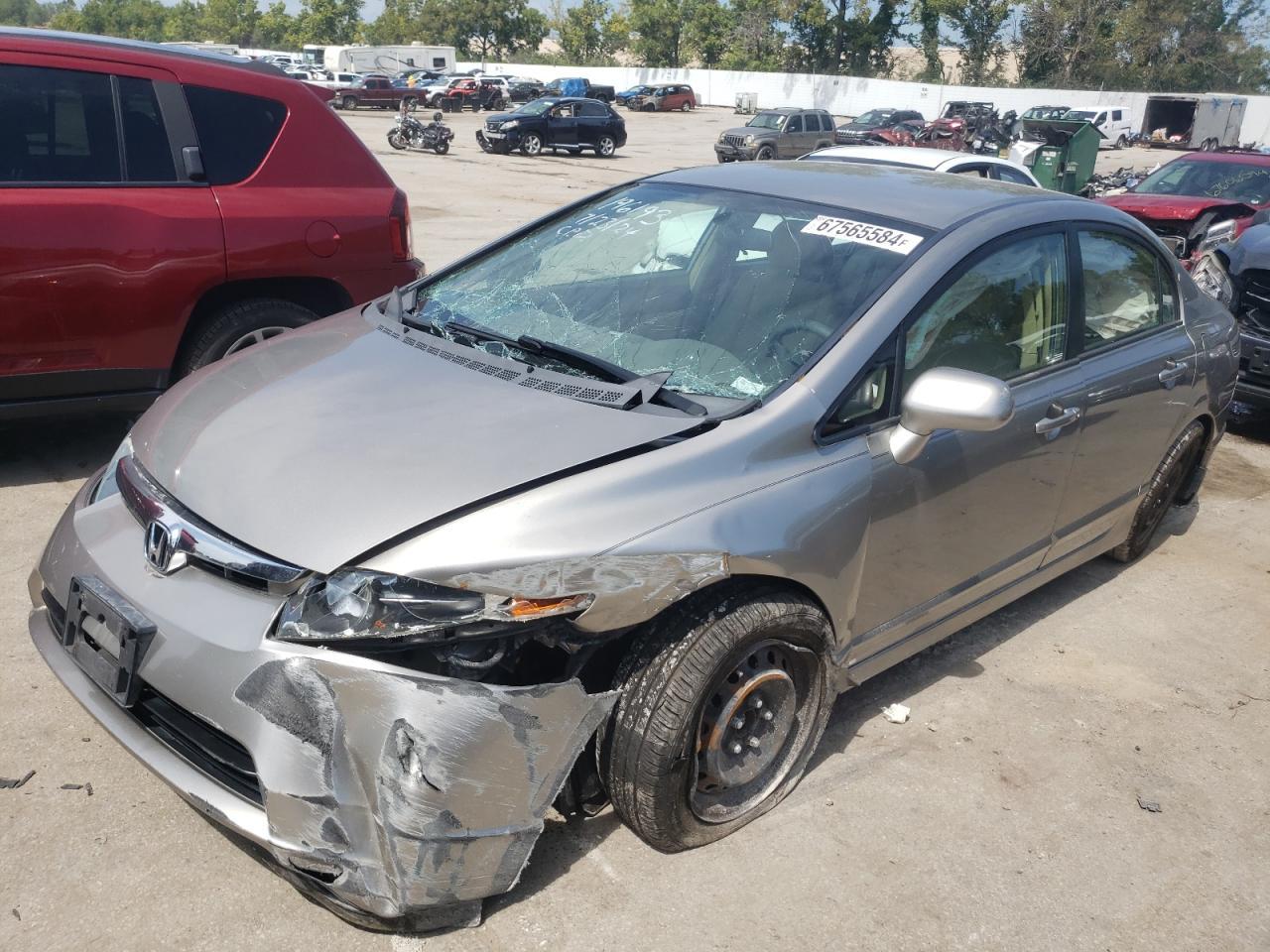 HONDA CIVIC LX 2006 gray sedan 4d gas 1HGFA165X6L128657 photo #1