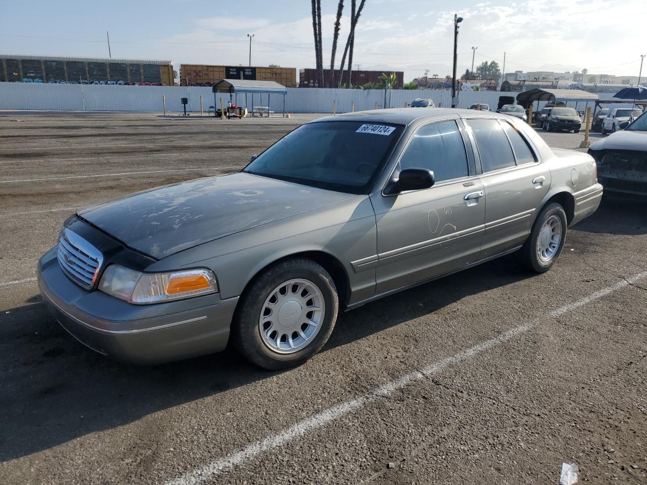 FORD CROWN VICT 2001 gray sedan 4d gas 2FAFP74W61X102540 photo #1