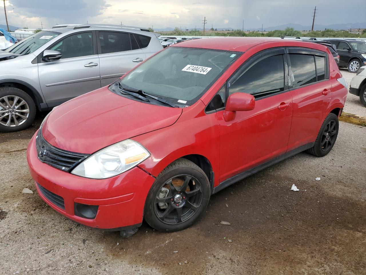 NISSAN VERSA S 2011 red hatchbac gas 3N1BC1CP6BL490113 photo #1