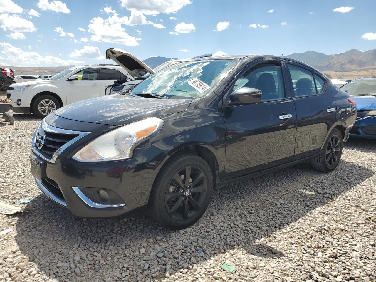 NISSAN VERSA S 2015 black sedan 4d gas 3N1CN7AP1FL802722 photo #1