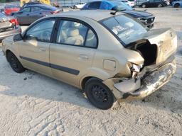 KIA RIO BASE 2009 gold sedan 4d gas KNADE223196519166 photo #3