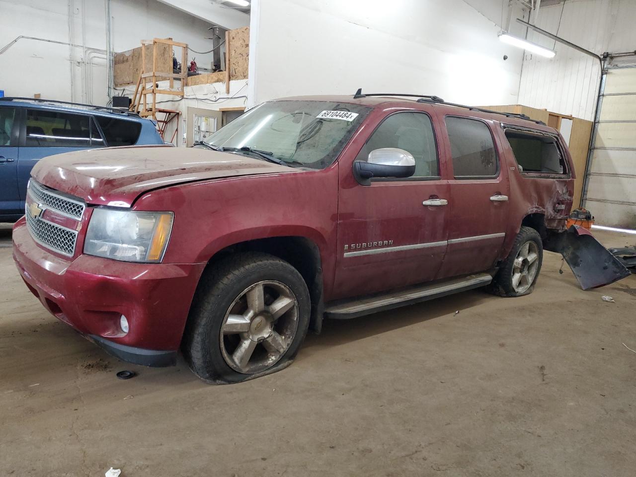 CHEVROLET SUBURBAN K 2009 red 4dr spor flexible fuel 1GNFK36369R180625 photo #1