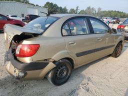 KIA RIO BASE 2009 gold sedan 4d gas KNADE223196519166 photo #4