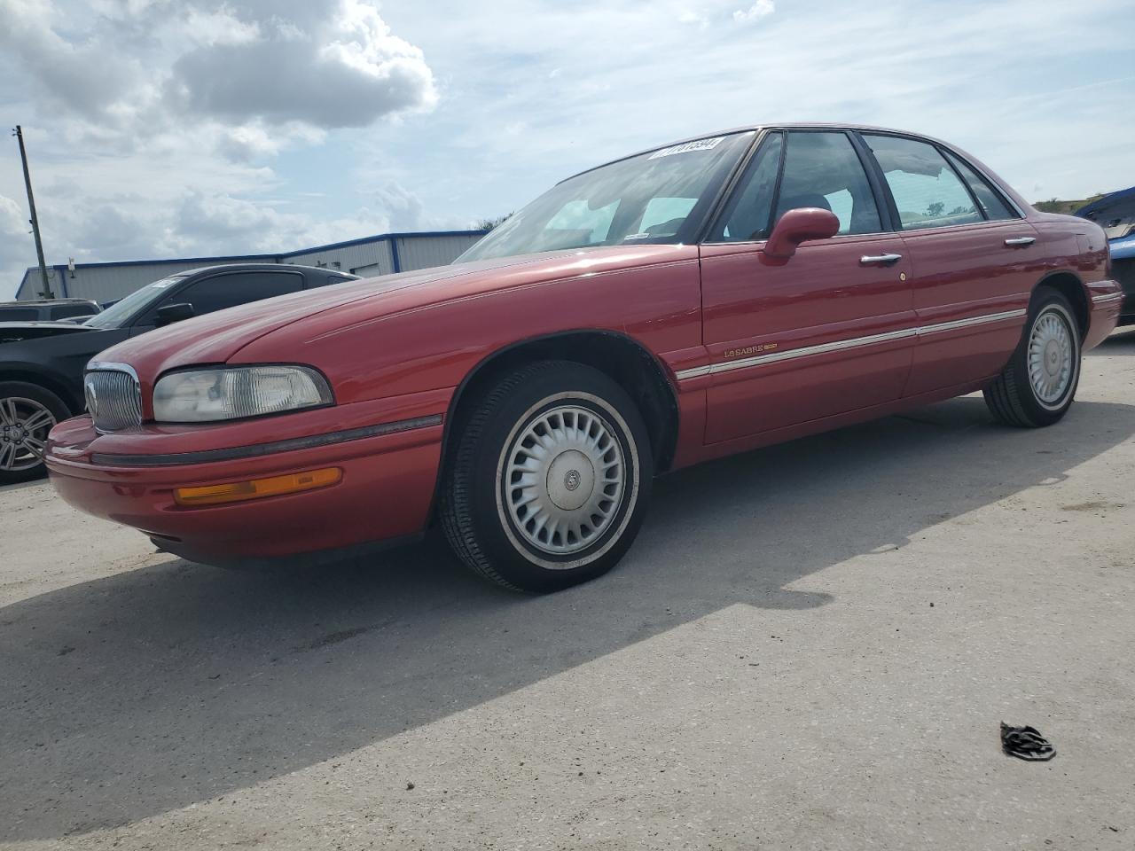 BUICK LESABRE LI 1997 red  gas 1G4HR52K7VH556380 photo #1