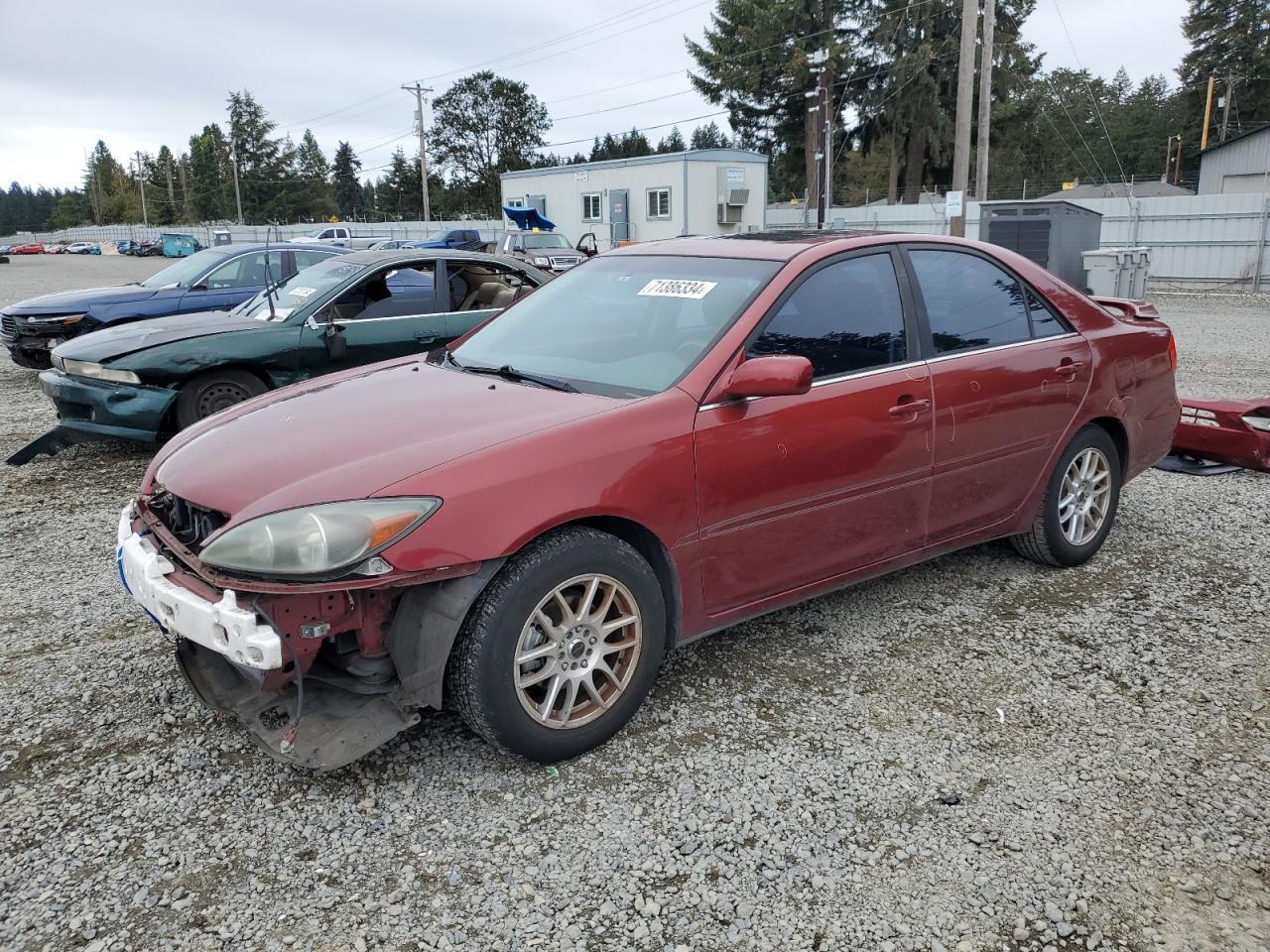 TOYOTA CAMRY LE 2003 red  gas JTDBE32K130193757 photo #1