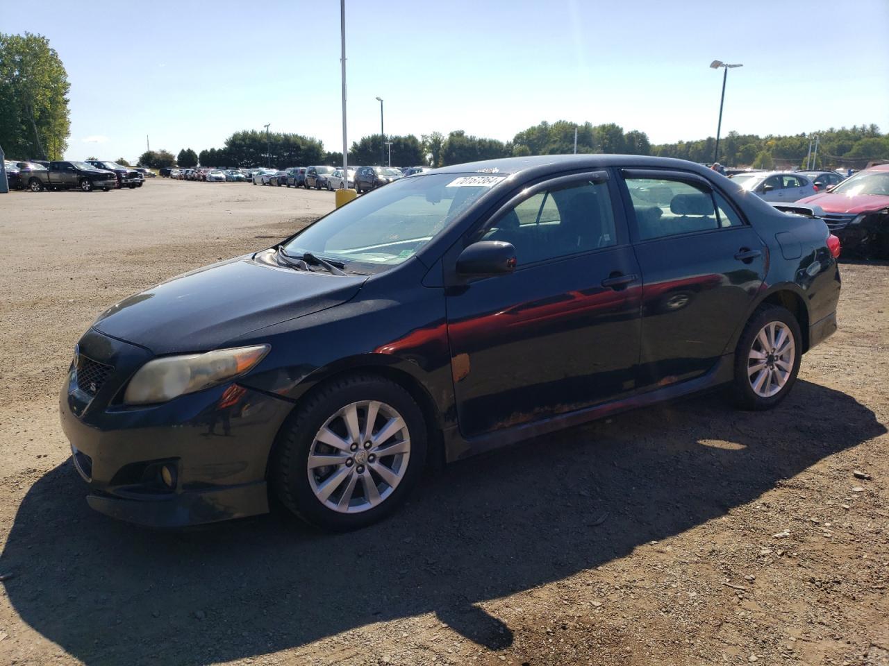 TOYOTA COROLLA BA 2010 black sedan 4d gas 2T1BU4EE4AC346147 photo #1