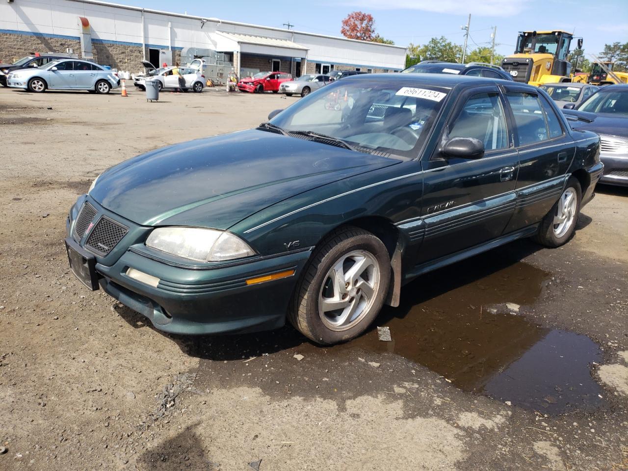 PONTIAC GRAND AM G 1995 green  gas 1G2NW55M8SC801634 photo #1