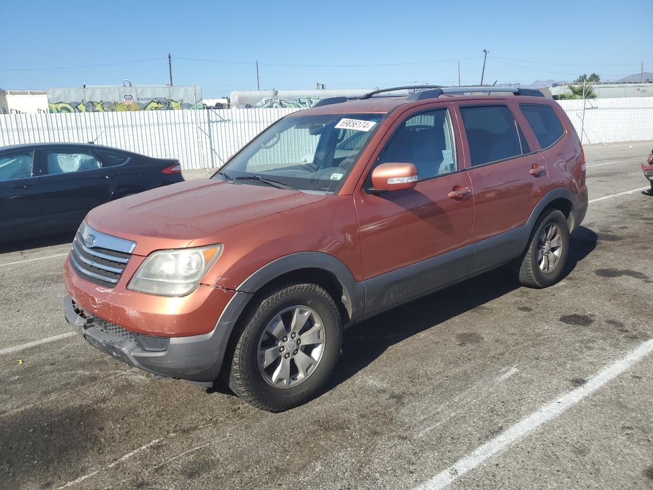 KIA BORREGO LX 2009 orange 4dr spor gas KNDJH741795026393 photo #1