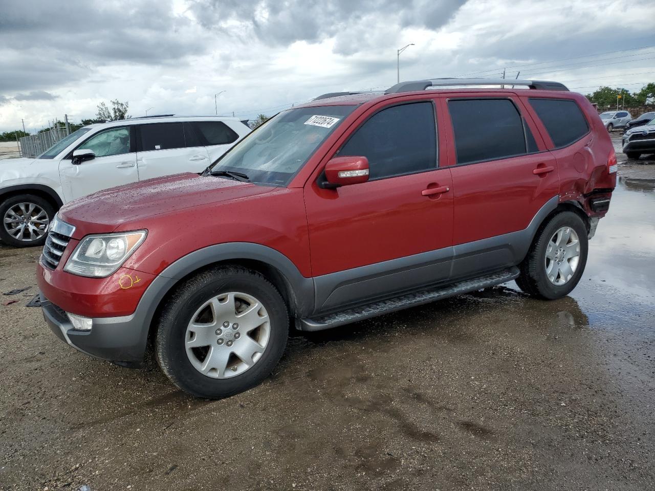 KIA BORREGO LX 2009 red  gas KNDJJ741395024385 photo #1