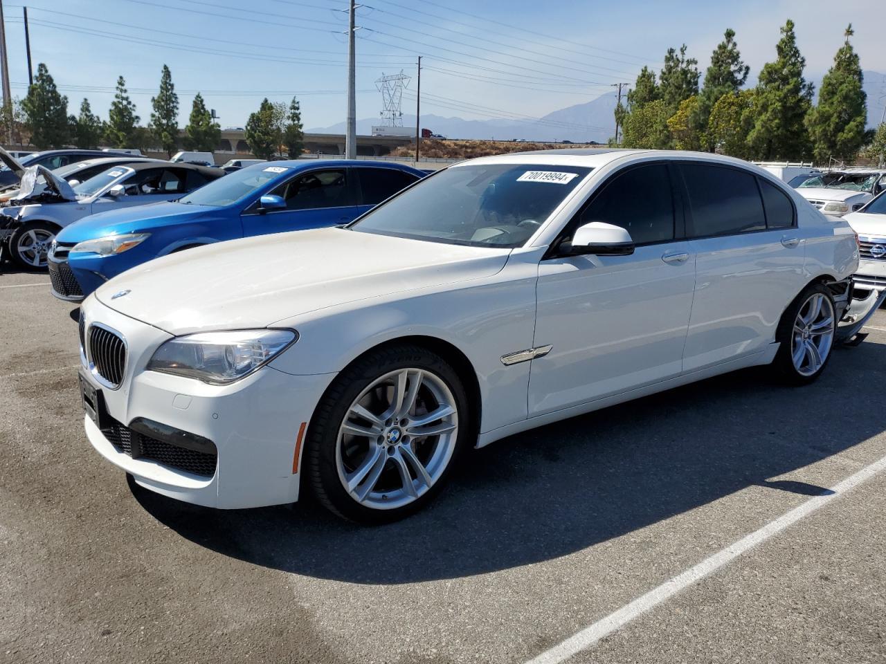 BMW 740 LI 2015 white sedan 4d gas WBAYE4C55FD947455 photo #1