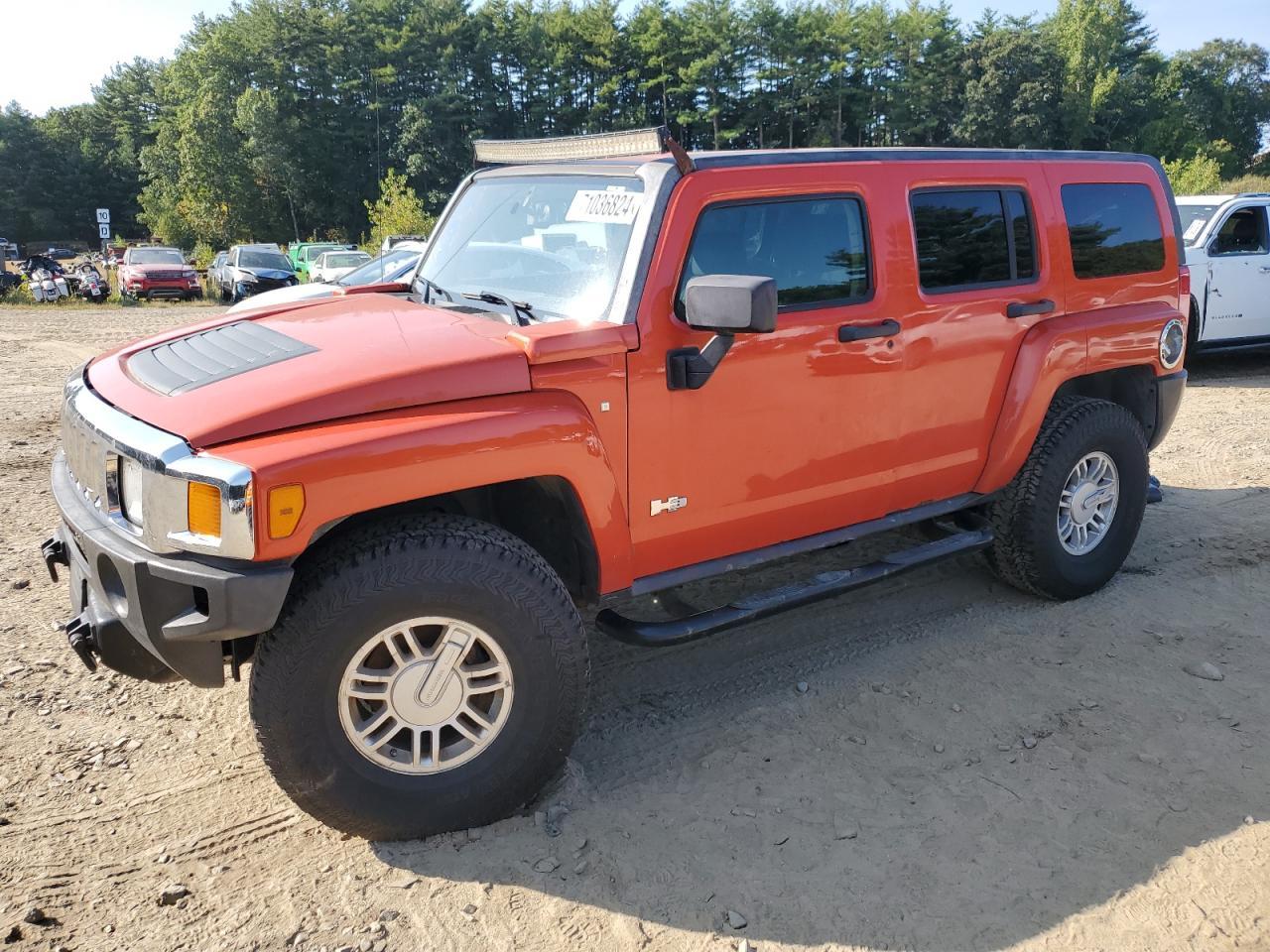 HUMMER H3 2009 orange  gas 5GTEN13E098139623 photo #1