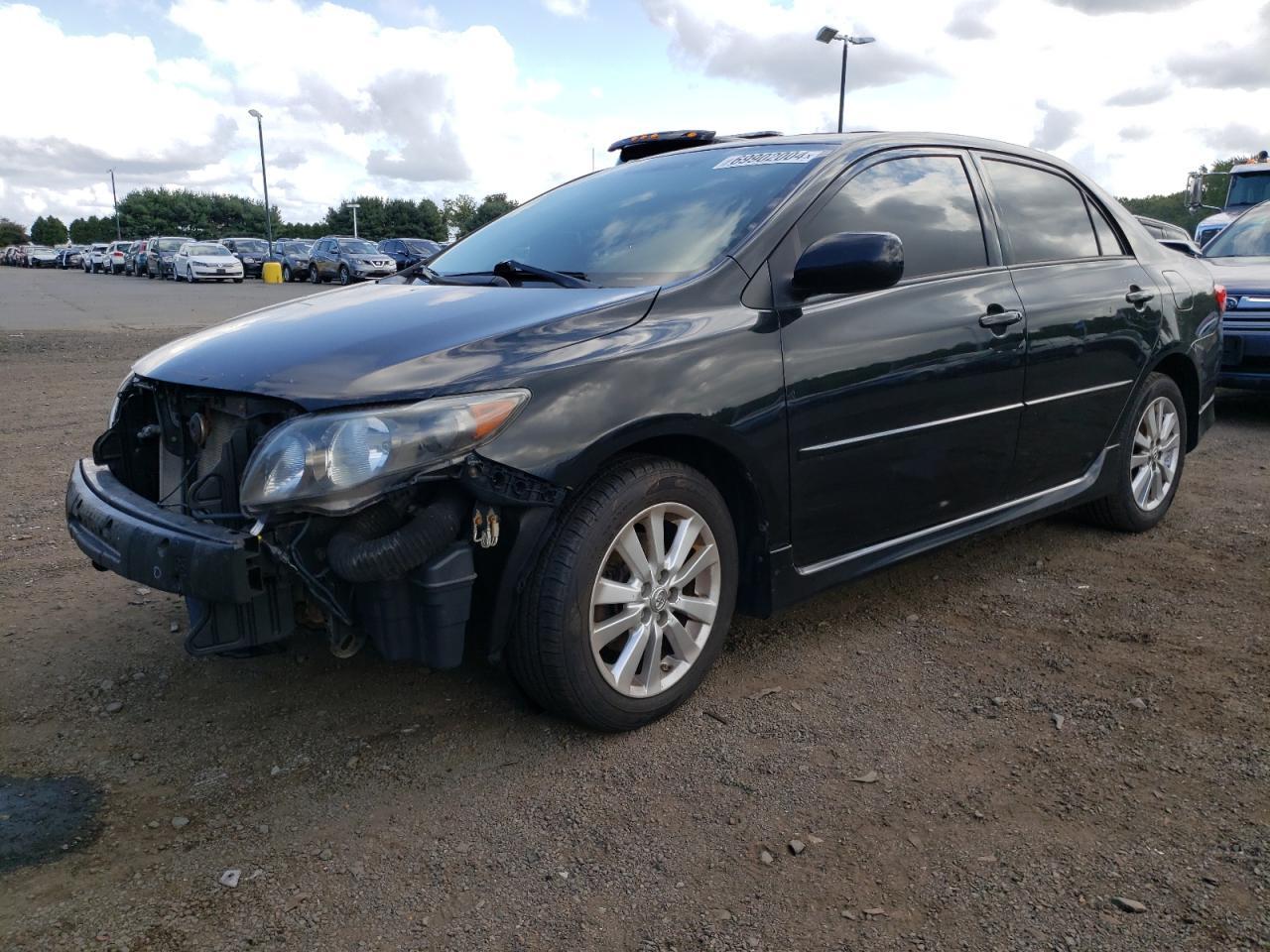 TOYOTA COROLLA BA 2010 black sedan 4d gas 2T1BU4EE1AC470814 photo #1