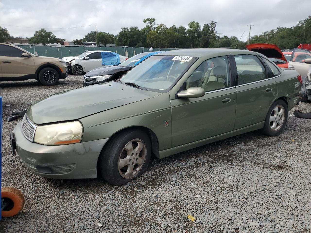 SATURN L300 2003 green sedan 4d gas 1G8JW54R43Y547099 photo #1