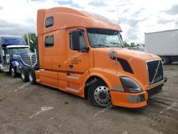 VOLVO VN VNL 2012 orange tractor diesel 4V4NC9EH2CN536542 photo #2