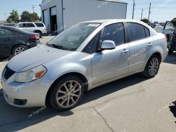 SUZUKI SX4 LE 2011 silver sedan 4d gas JS2YC5A24B6302226 photo #2