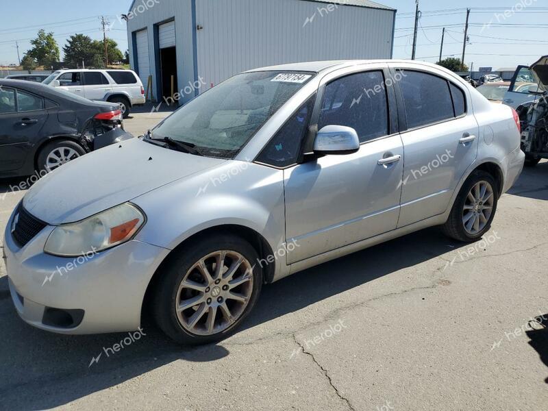 SUZUKI SX4 LE 2011 silver sedan 4d gas JS2YC5A24B6302226 photo #1