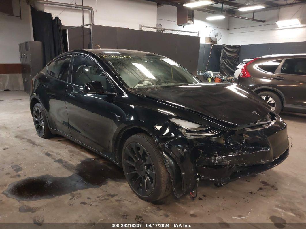 2023 TESLA MODEL Y AWD/LONG RANGE DUAL MOTOR ALL-WHEEL DRIVE Black  Electric 7SAYGDEE0PA141429 photo #1