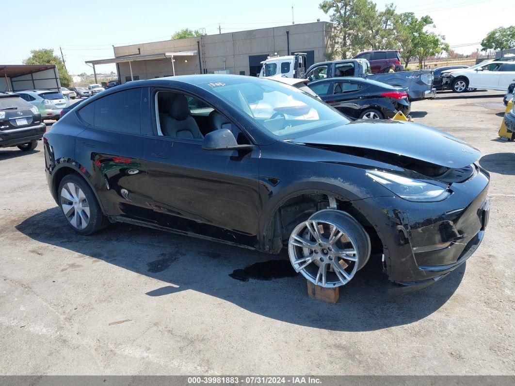 2023 TESLA MODEL Y AWD/LONG RANGE DUAL MOTOR ALL-WHEEL DRIVE Black  Electric 7SAYGAEE1PF840103 photo #1